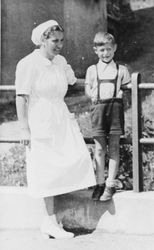 Joel Fabian with a nurse at a sanatorium in Davos, Switzerland, where he is recovering from tuberculosis he contracted in Theresienstadt. Joel Fabian with a nurse at a sanatorium in Davos, Switzerland, where he is recovering from tuberculosis he contracted in Theresienstadt.